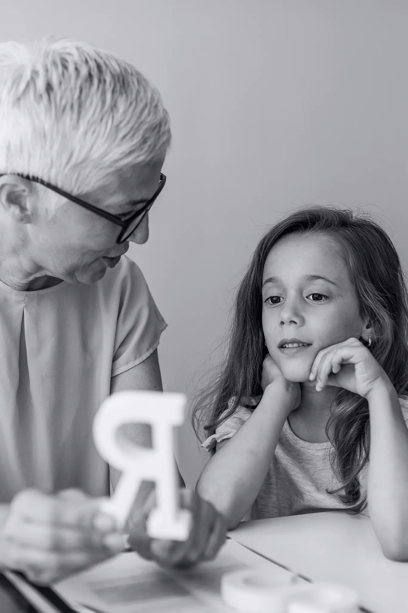 a young girl at a speech therapy clinic with specialist